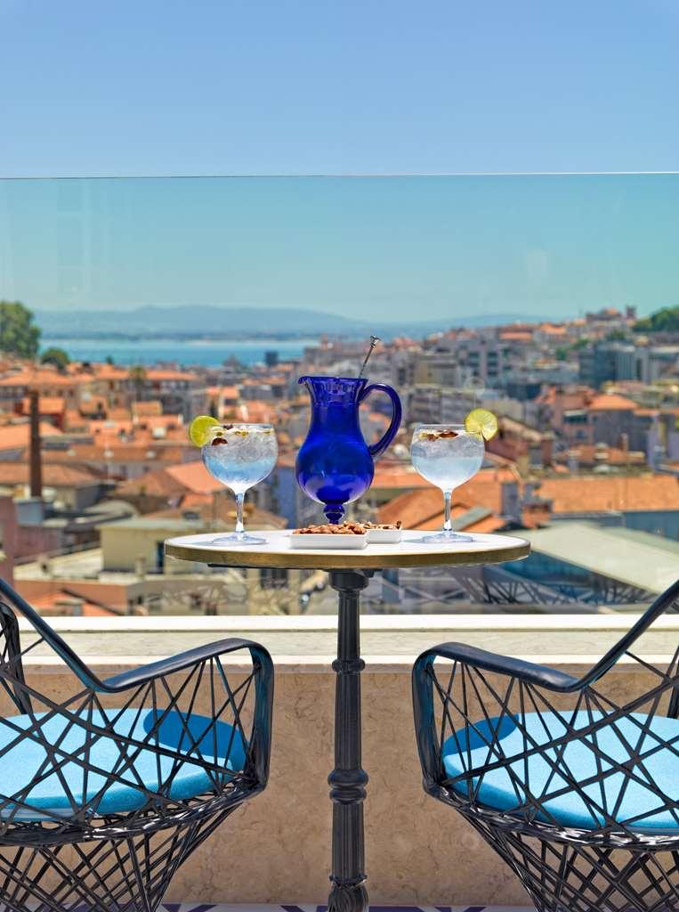 فندق أتش 10 دوكي دي لول Lisboa المطعم الصورة